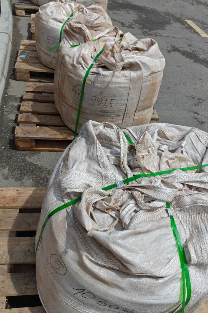 Numbered one-tonne jumbo bags of fluorspar concentrate on wooden pallets at the Erenhot yard